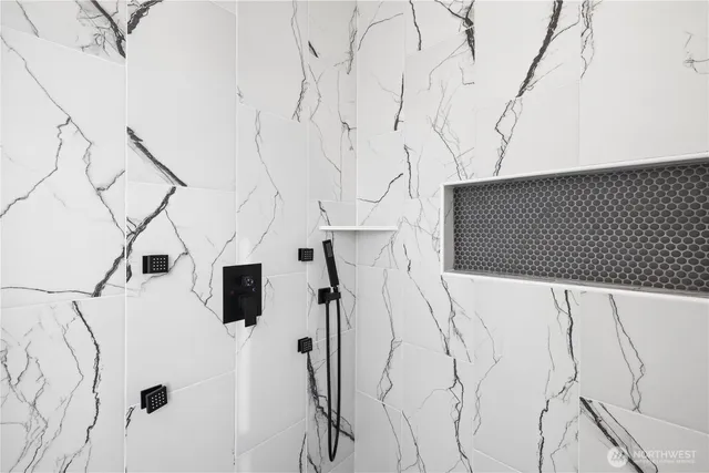 a view of a bathroom with shower