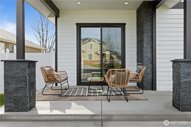 a dining room with furniture and window