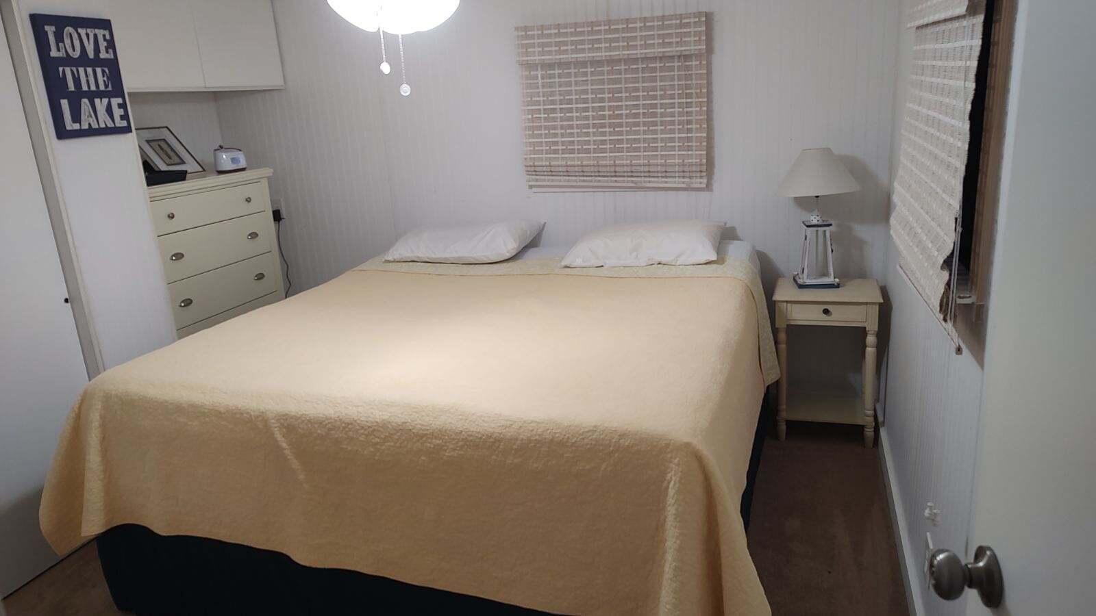 2044 Southeast 34th Lane Okeechobee, FL 34974 - Photo 5 of 11 a bedroom with a bed and a window