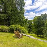 a view of a yard with a bench