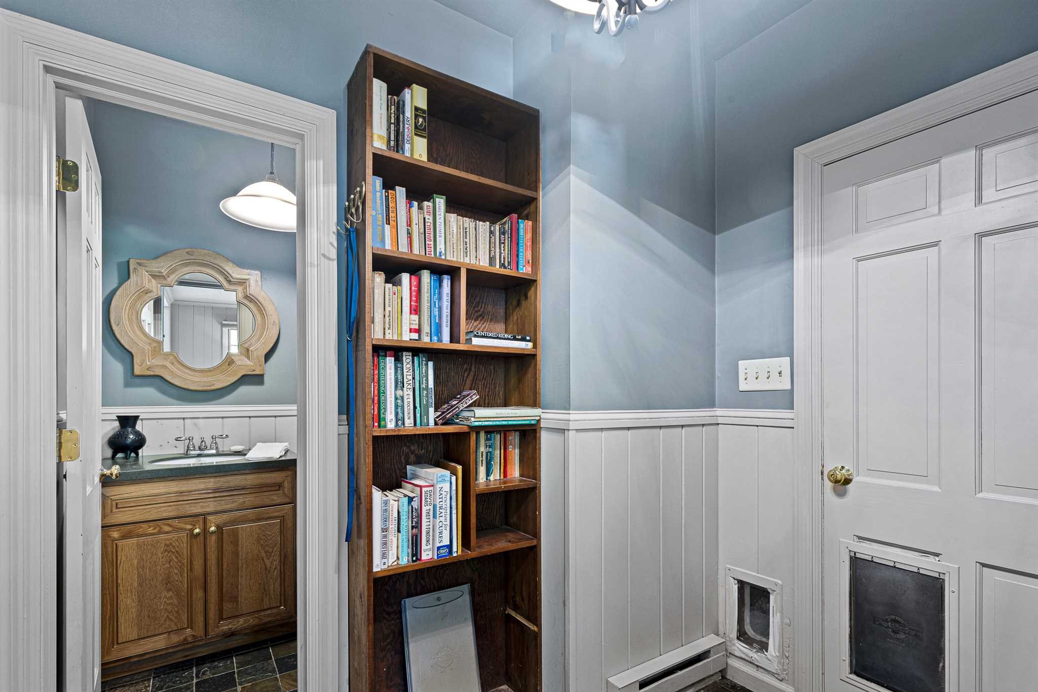 7 Kerr Road Rhinebeck, NY 12572 - Photo 12 of 21 a living room with fish tank and a bookshelf