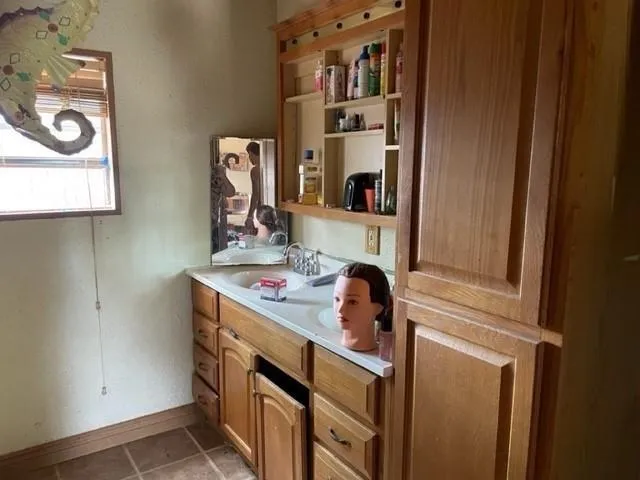 a bathroom with a toilet and a sink