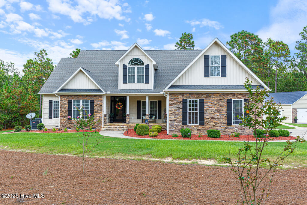 286 Morgan Trail Court West End, NC 27376 - Photo 2 of 66 with an oversized 2 car garage AND a detached 2+ car garage