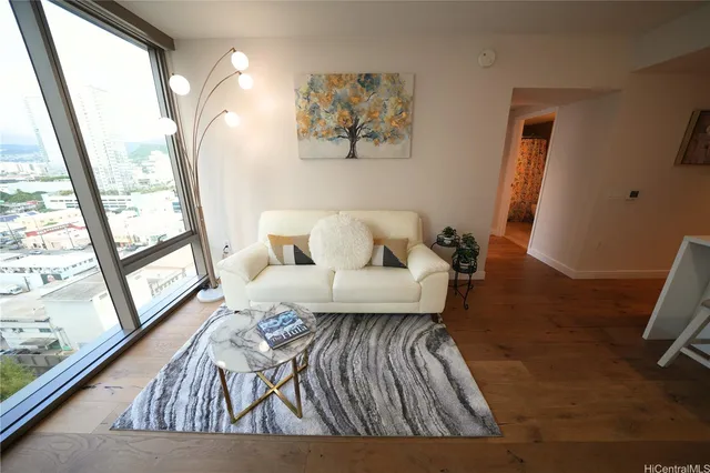 a living room with furniture and a window
