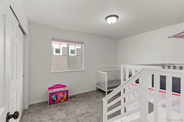 a view of a room with baby toys