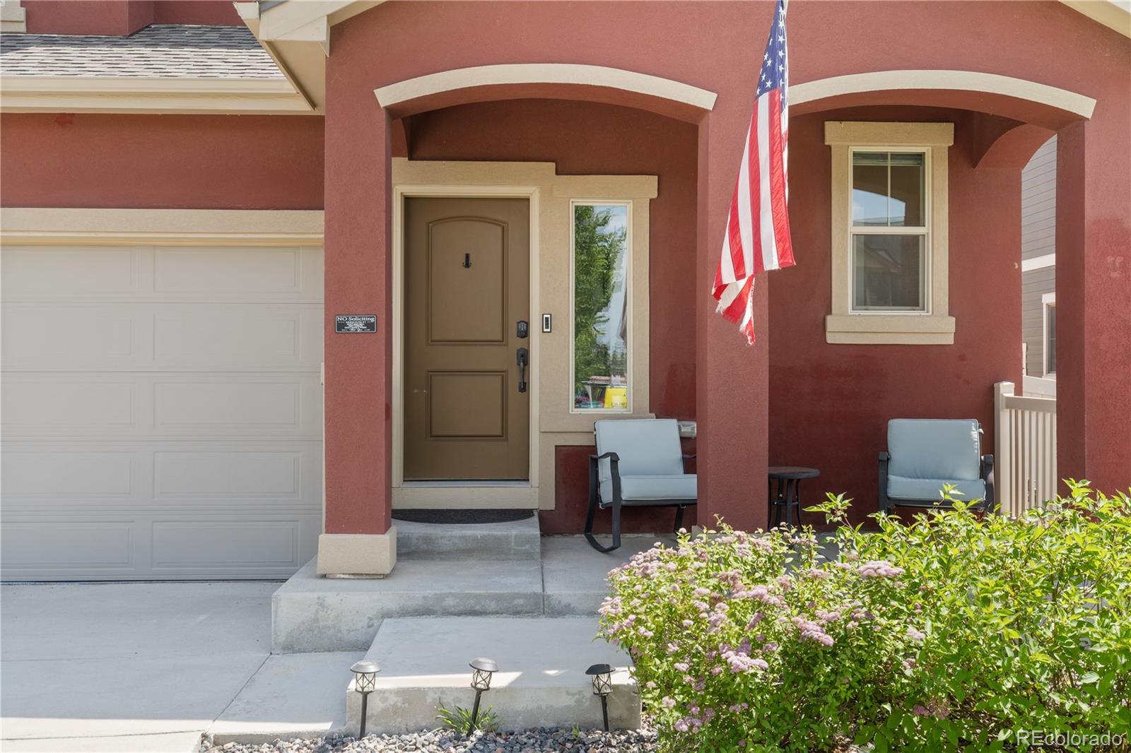 1074 Acadia Circle Erie, CO 80516 - Photo 3 of 50 a front view of a house