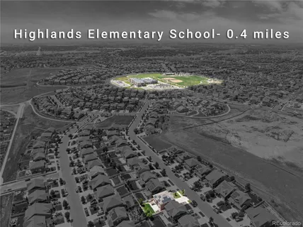 a view of a street sign under a large tree