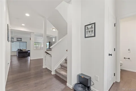 a view of living room and workspace
