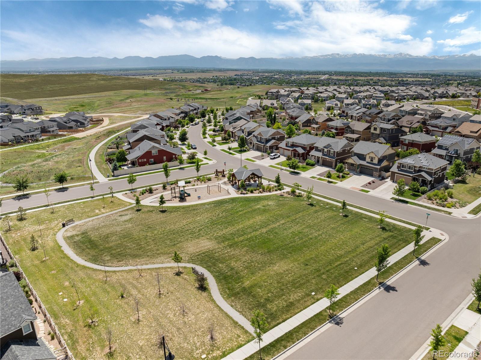 1074 Acadia Circle Erie, CO 80516 - Photo 43 of 50 an aerial view of residential houses with outdoor space