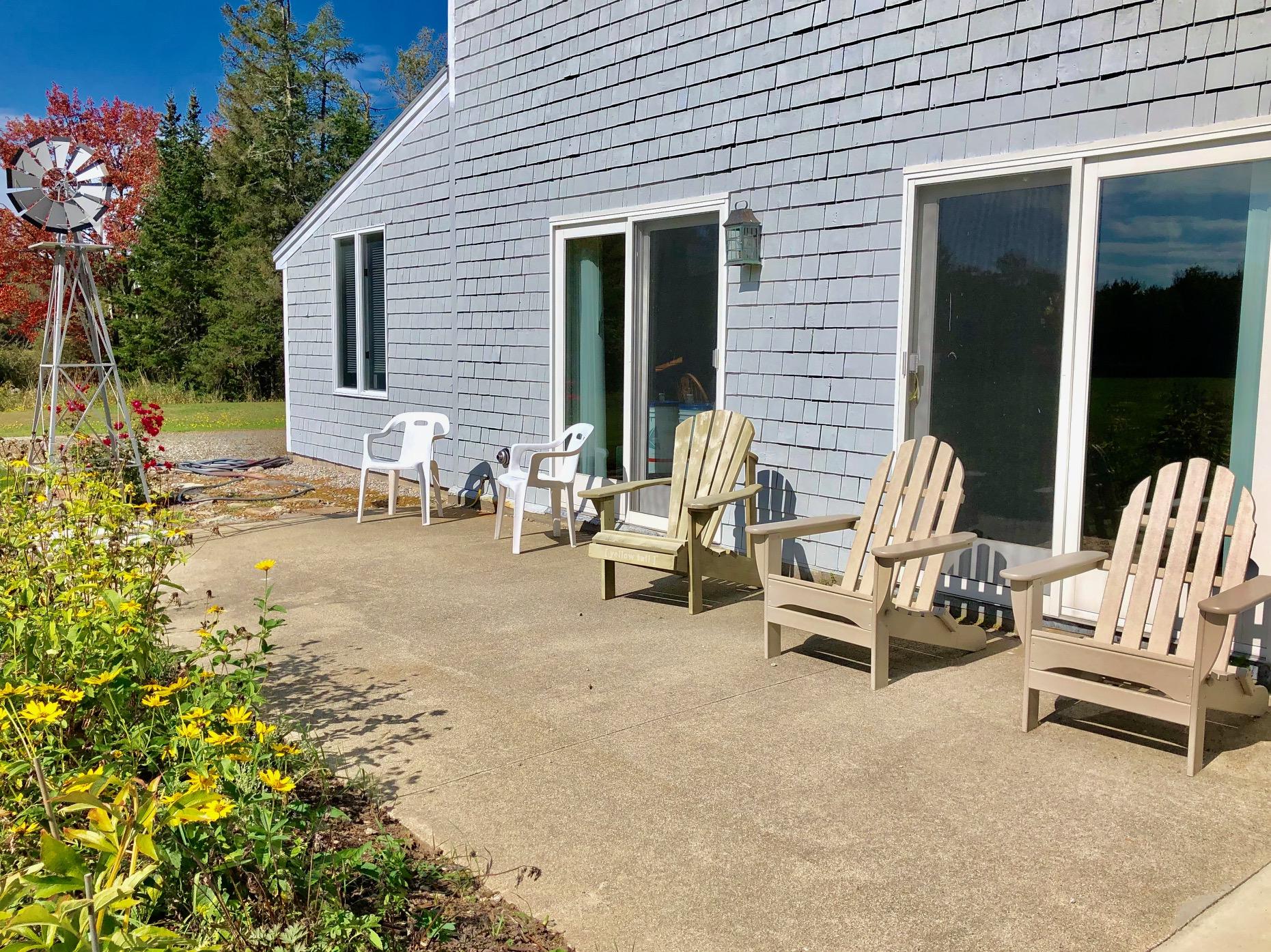 24 Minnow Brook Road Ellsworth, ME 04605 - Photo 10 of 74 Sunny patio off the sunroom