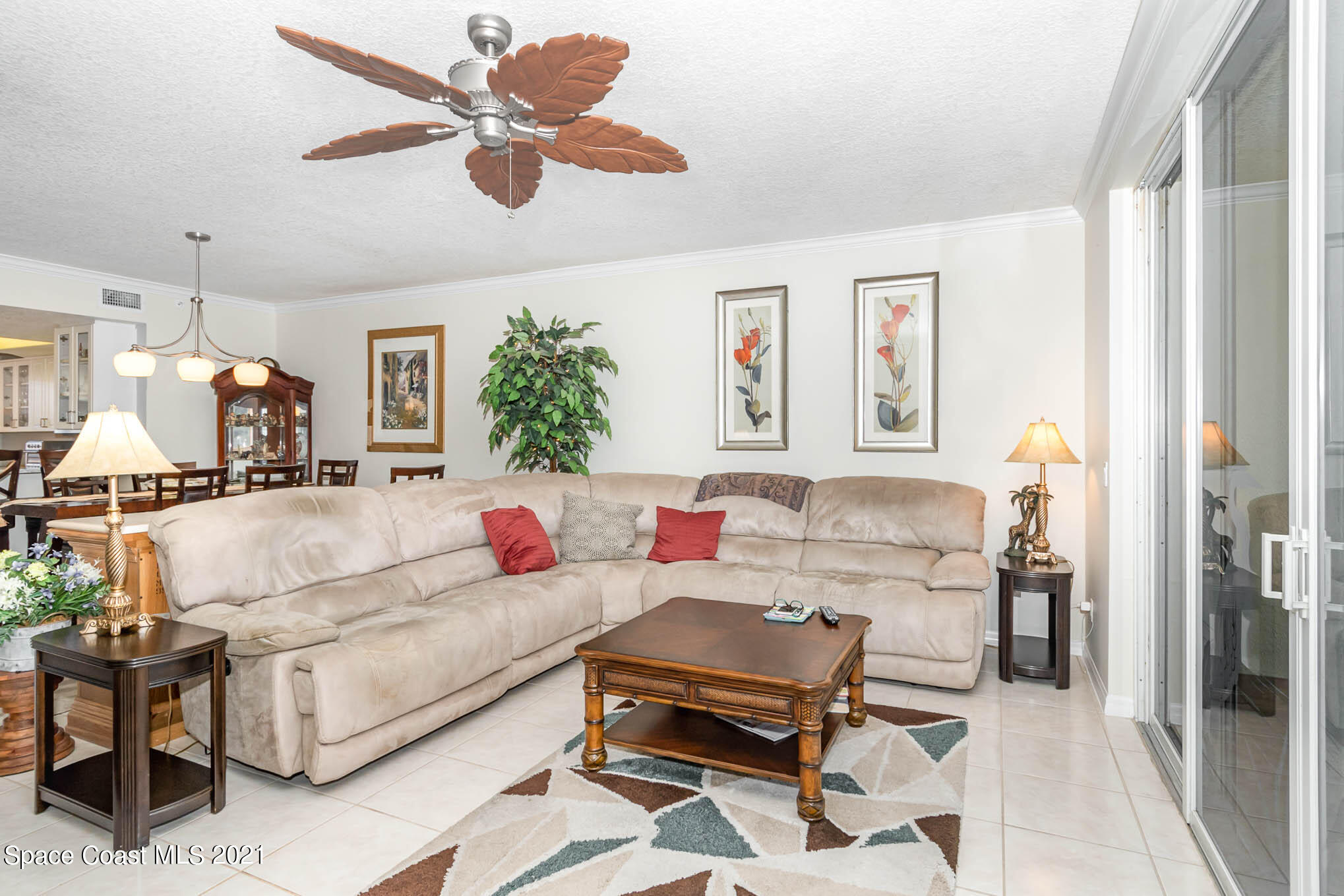 100 Riverside Drive, Unit 705 Cocoa, FL 32922 - Photo 12 of 39 a living room with furniture and kitchen view