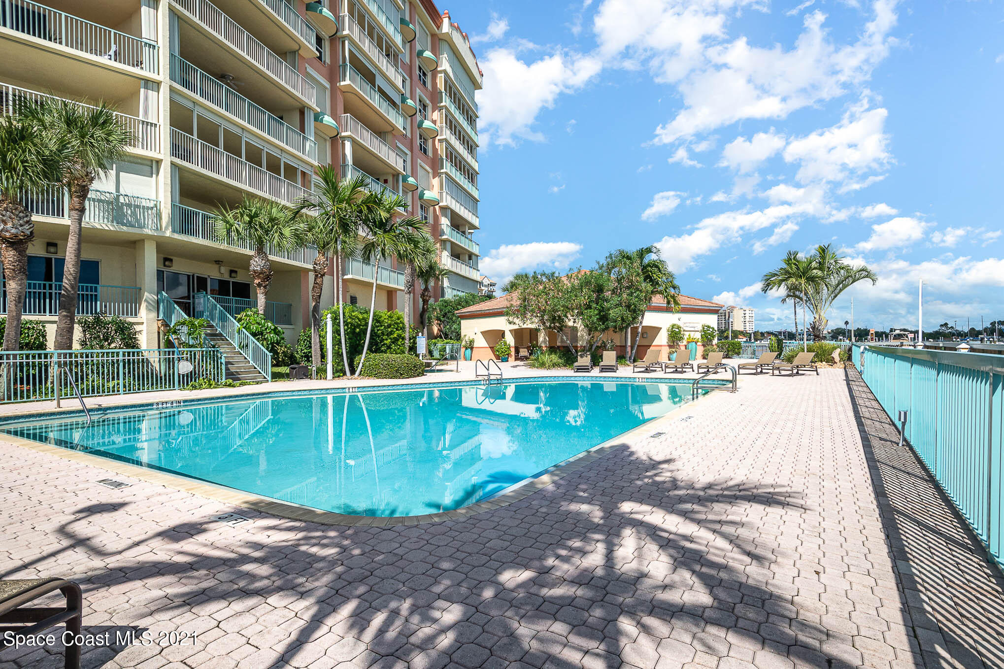 100 Riverside Drive, Unit 705 Cocoa, FL 32922 - Photo 33 of 39 a view of a swimming pool with a patio