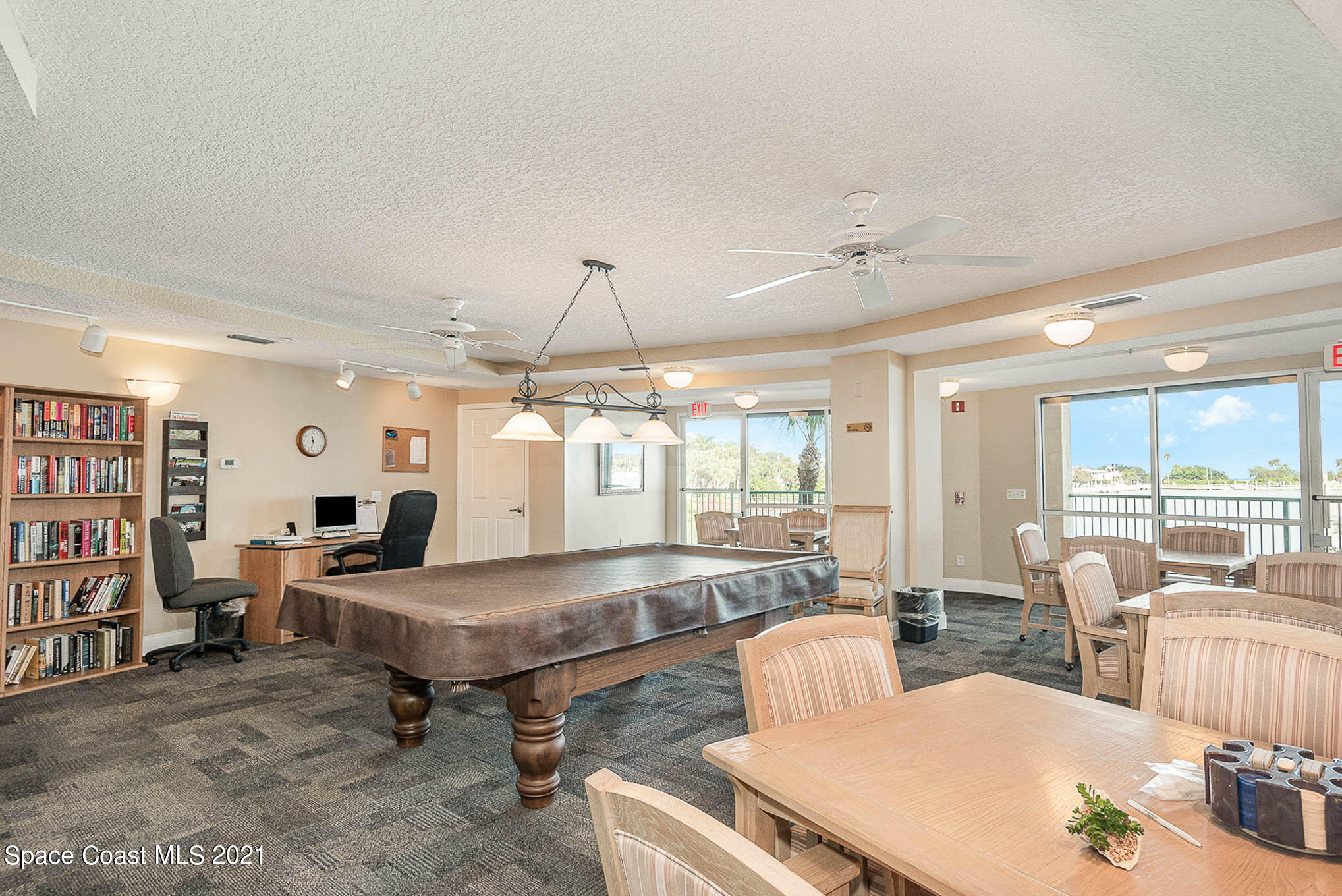 100 Riverside Drive, Unit 705 Cocoa, FL 32922 - Photo 36 of 39 a room with lots of table and chairs