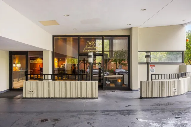 a view of a room with stairs and a couch