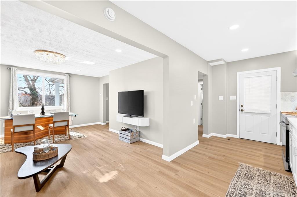 731 Chartiers Street Bridgeville, PA 15017 - Photo 12 of 48 a view of a livingroom with workspace and a window