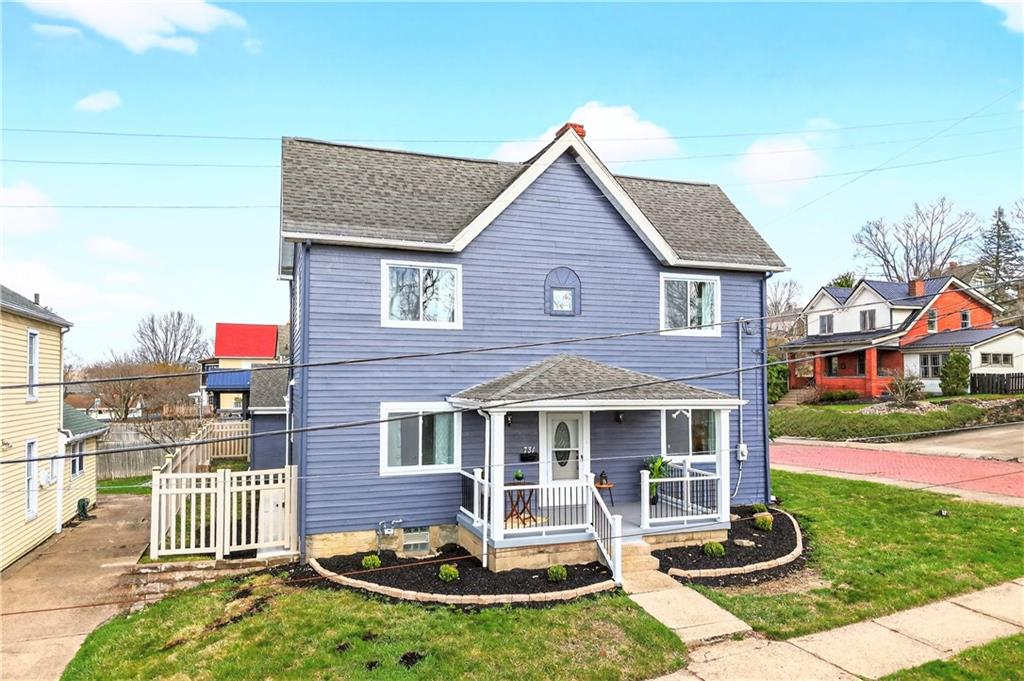 731 Chartiers Street Bridgeville, PA 15017 - Photo 2 of 48 a front view of a house with a yard