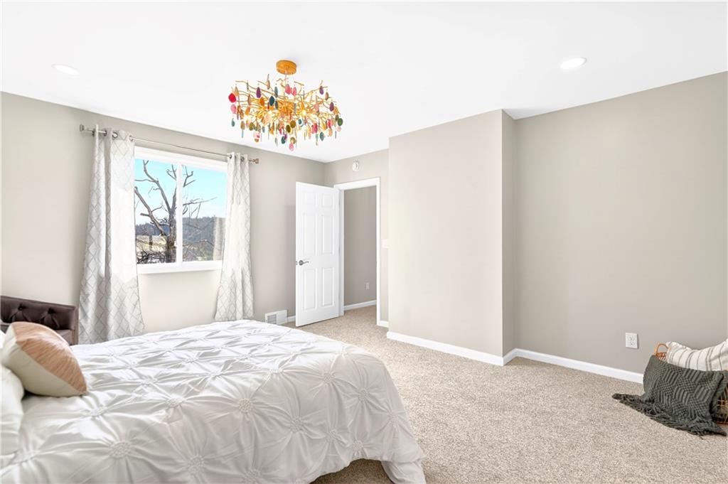 731 Chartiers Street Bridgeville, PA 15017 - Photo 27 of 48 a bedroom with a bed and a window