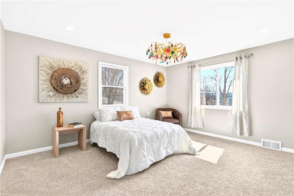 731 Chartiers Street Bridgeville, PA 15017 - Photo 28 of 48 a bedroom with a bed and a window