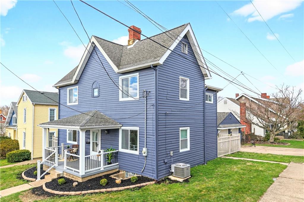 731 Chartiers Street Bridgeville, PA 15017 - Photo 3 of 48 a front view of a house with a yard
