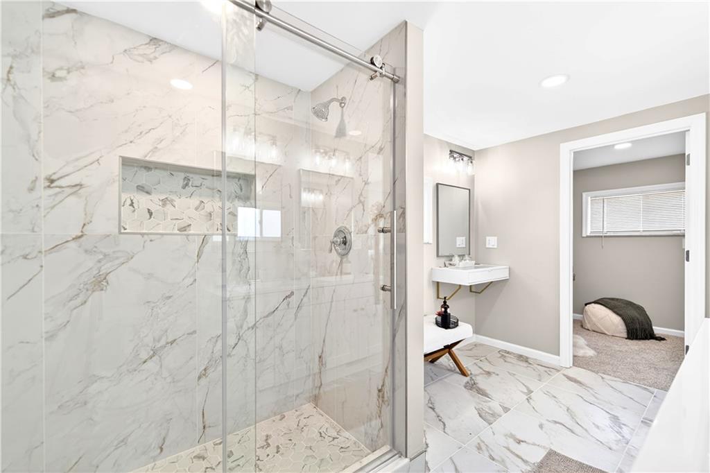 731 Chartiers Street Bridgeville, PA 15017 - Photo 32 of 48 a bathroom with a shower and a sink