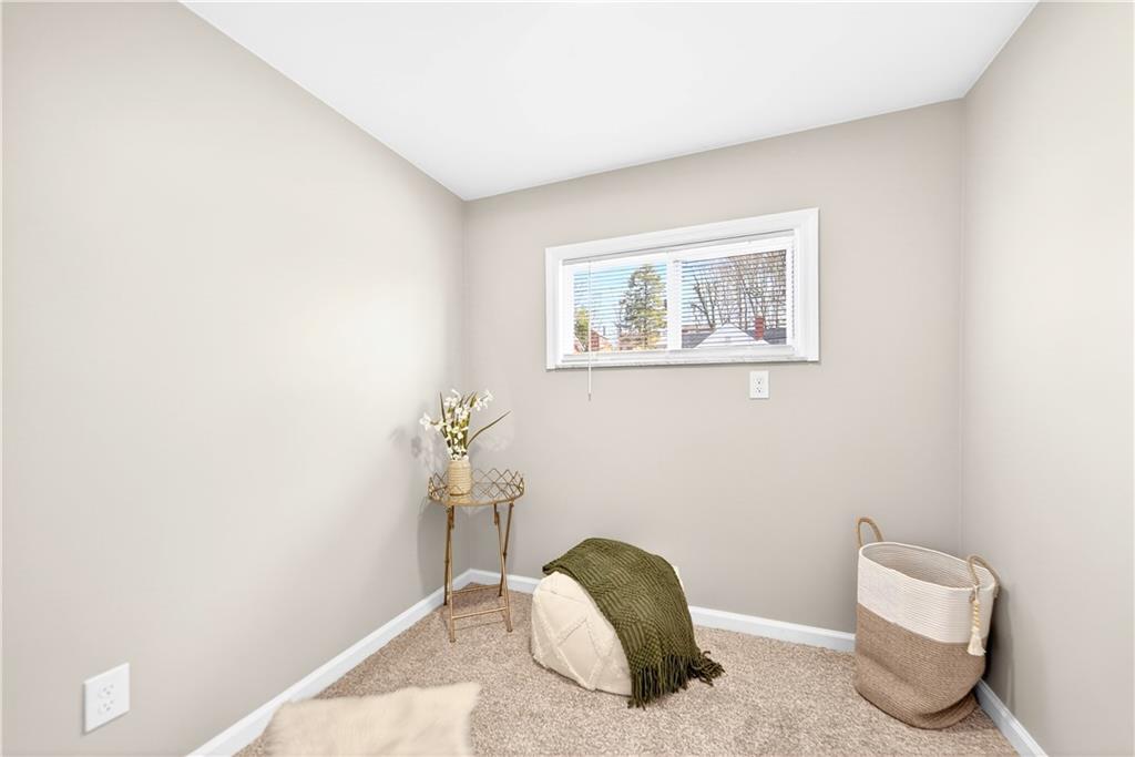 731 Chartiers Street Bridgeville, PA 15017 - Photo 33 of 48 a bedroom with a bed and a wall painting