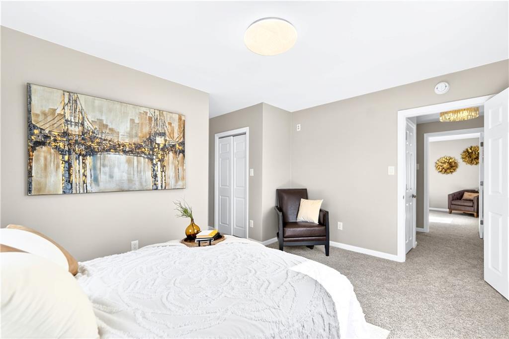 731 Chartiers Street Bridgeville, PA 15017 - Photo 35 of 48 a bedroom with a bed and a painting on the wall