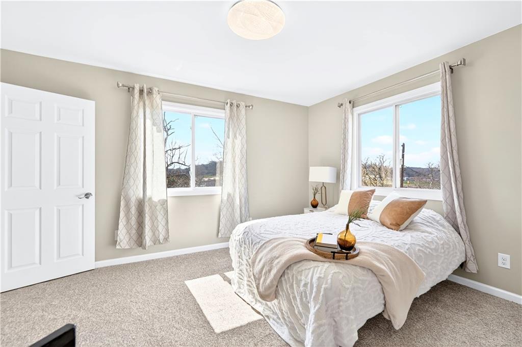 731 Chartiers Street Bridgeville, PA 15017 - Photo 36 of 48 a bedroom with a bed and a window