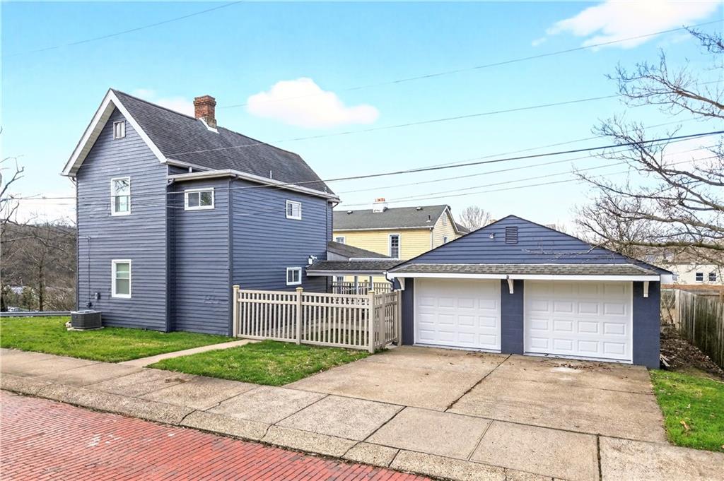 731 Chartiers Street Bridgeville, PA 15017 - Photo 4 of 48 front view of a house with a yard