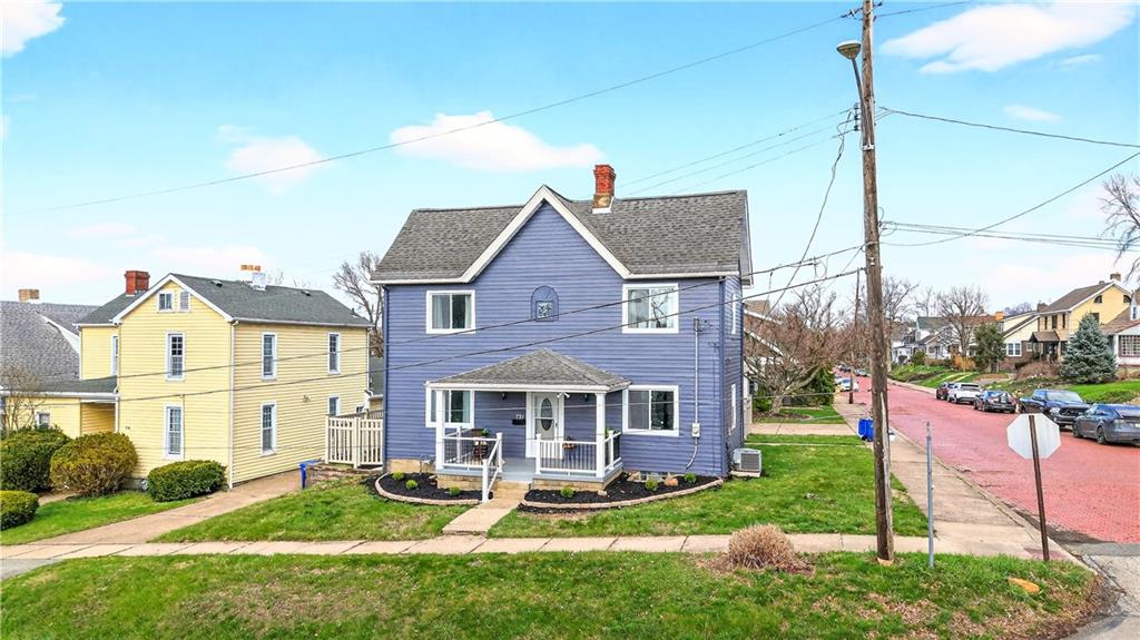 731 Chartiers Street Bridgeville, PA 15017 - Photo 46 of 48 a front view of a house with a yard