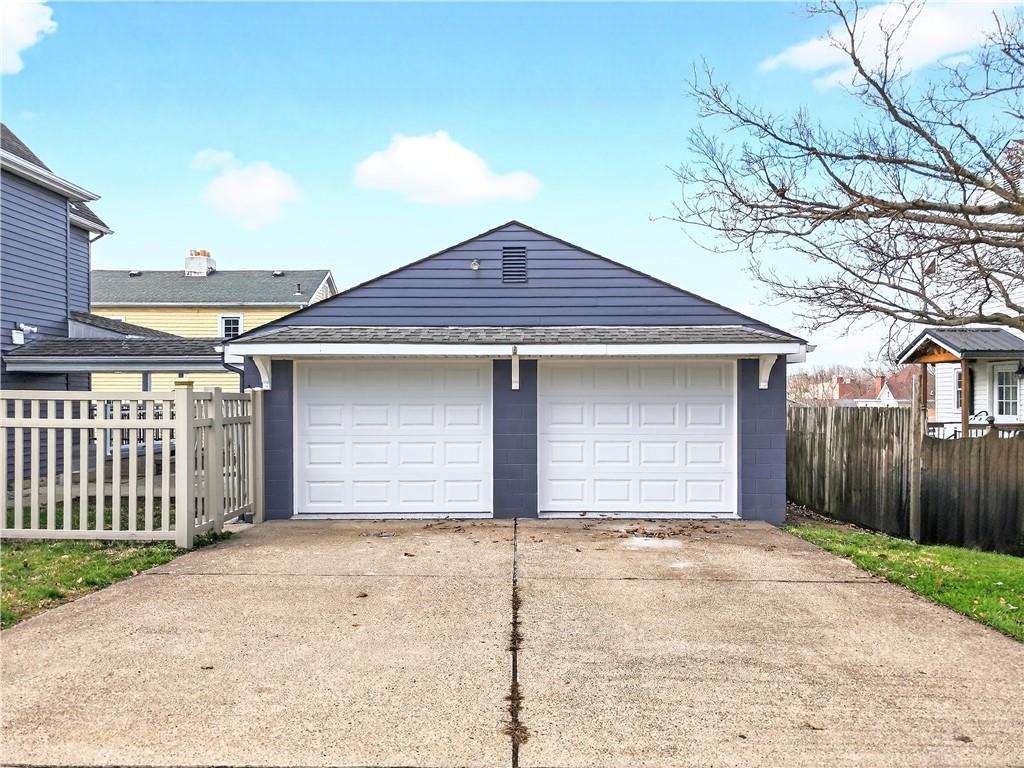 731 Chartiers Street Bridgeville, PA 15017 - Photo 48 of 48 a front view of a house with a garage
