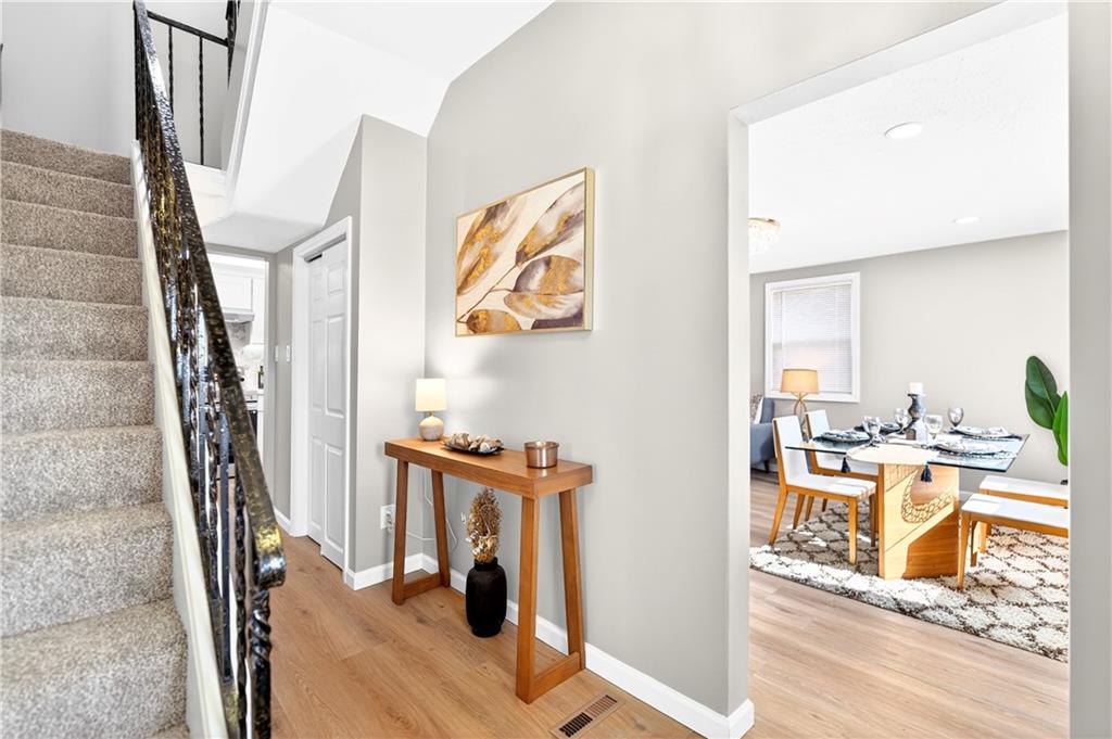 731 Chartiers Street Bridgeville, PA 15017 - Photo 6 of 48 a view of a living room with a fireplace