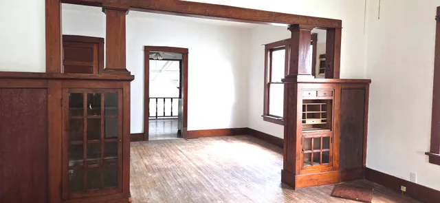 a bathroom with a toilet sink and window