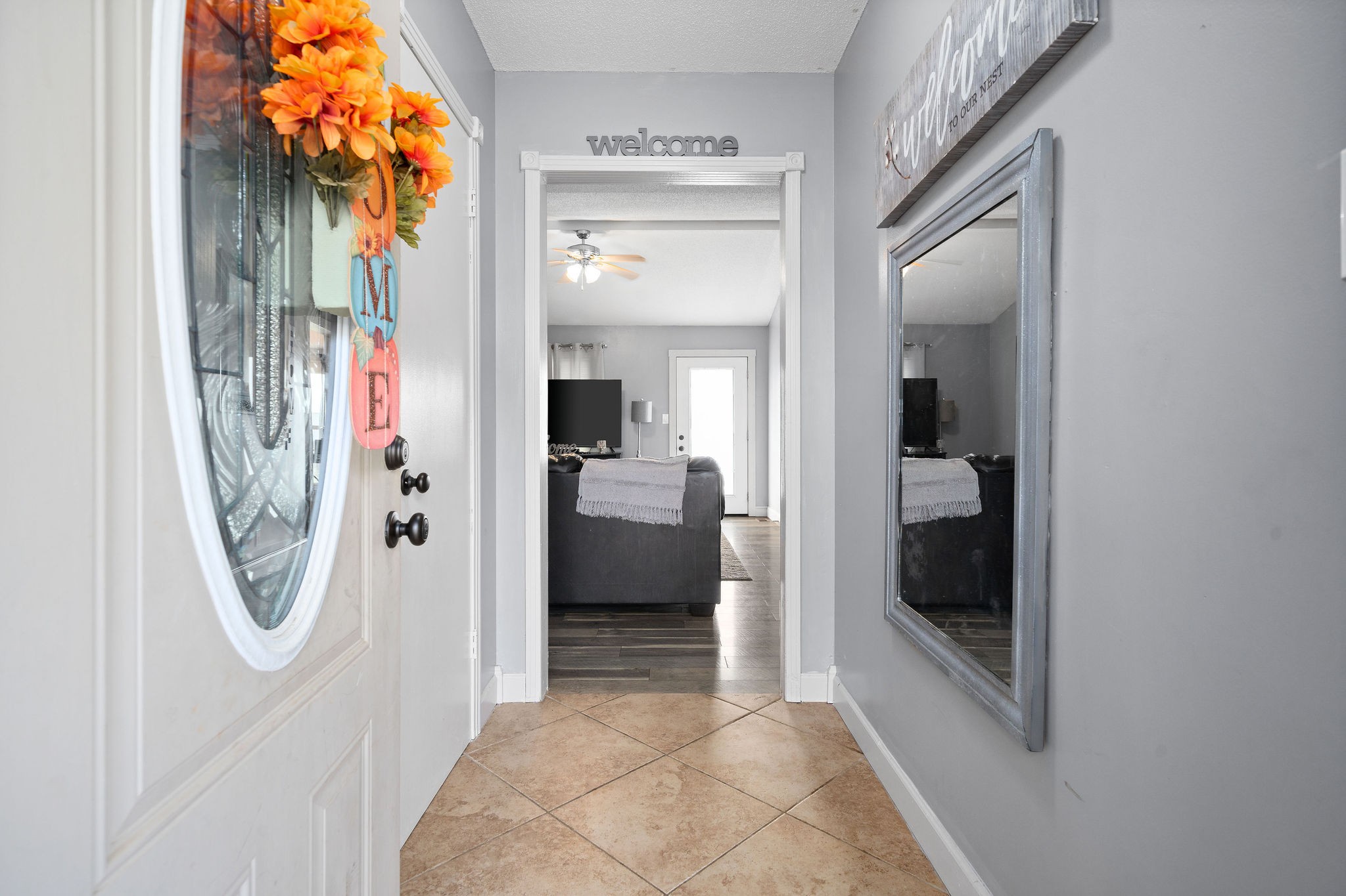 3410 Allen Road Clarksville, TN 37042 - Photo 2 of 12 a view of a hallway with a livingroom and a bathroom