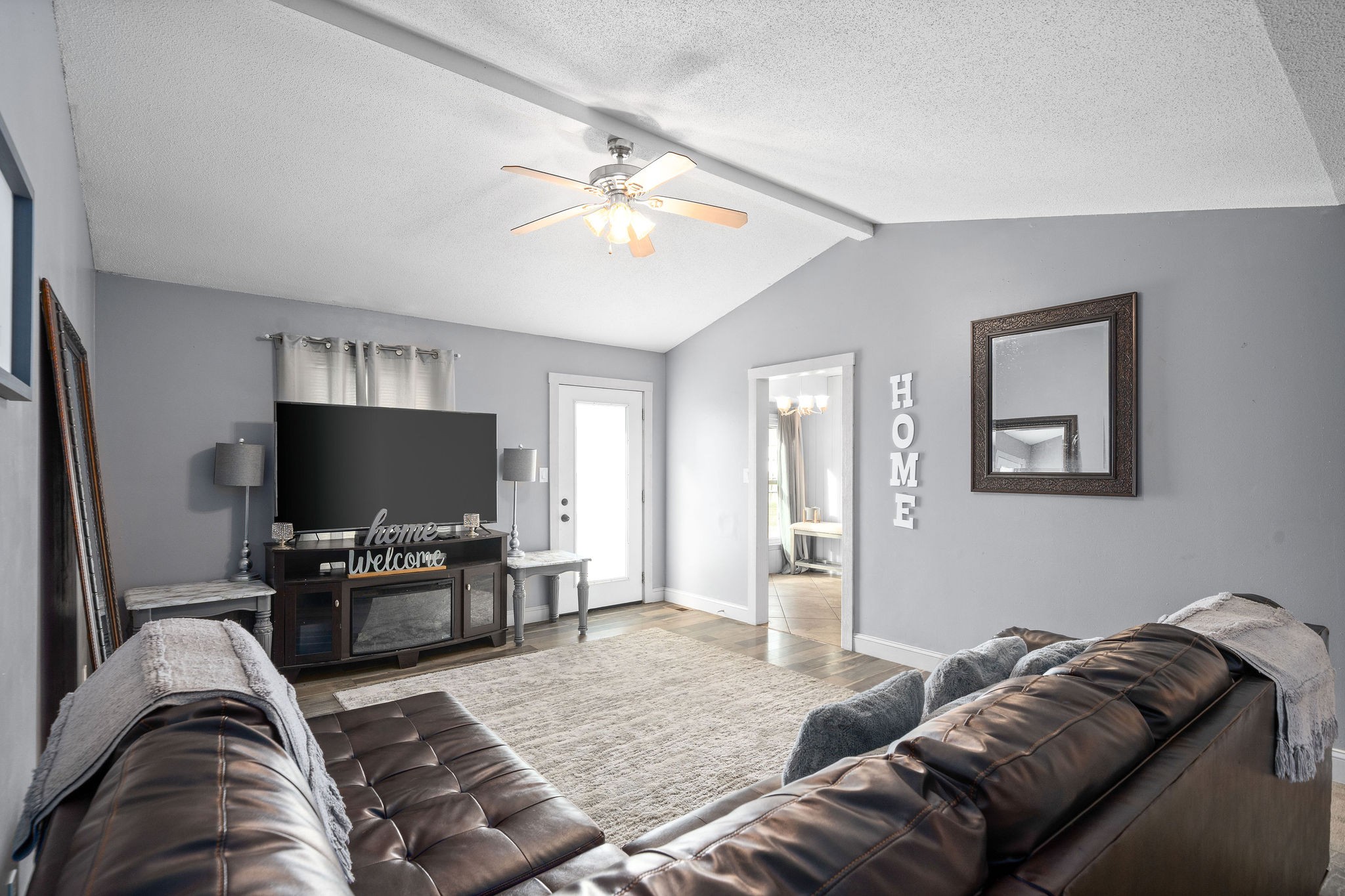 3410 Allen Road Clarksville, TN 37042 - Photo 3 of 12 a living room with furniture and a flat screen tv