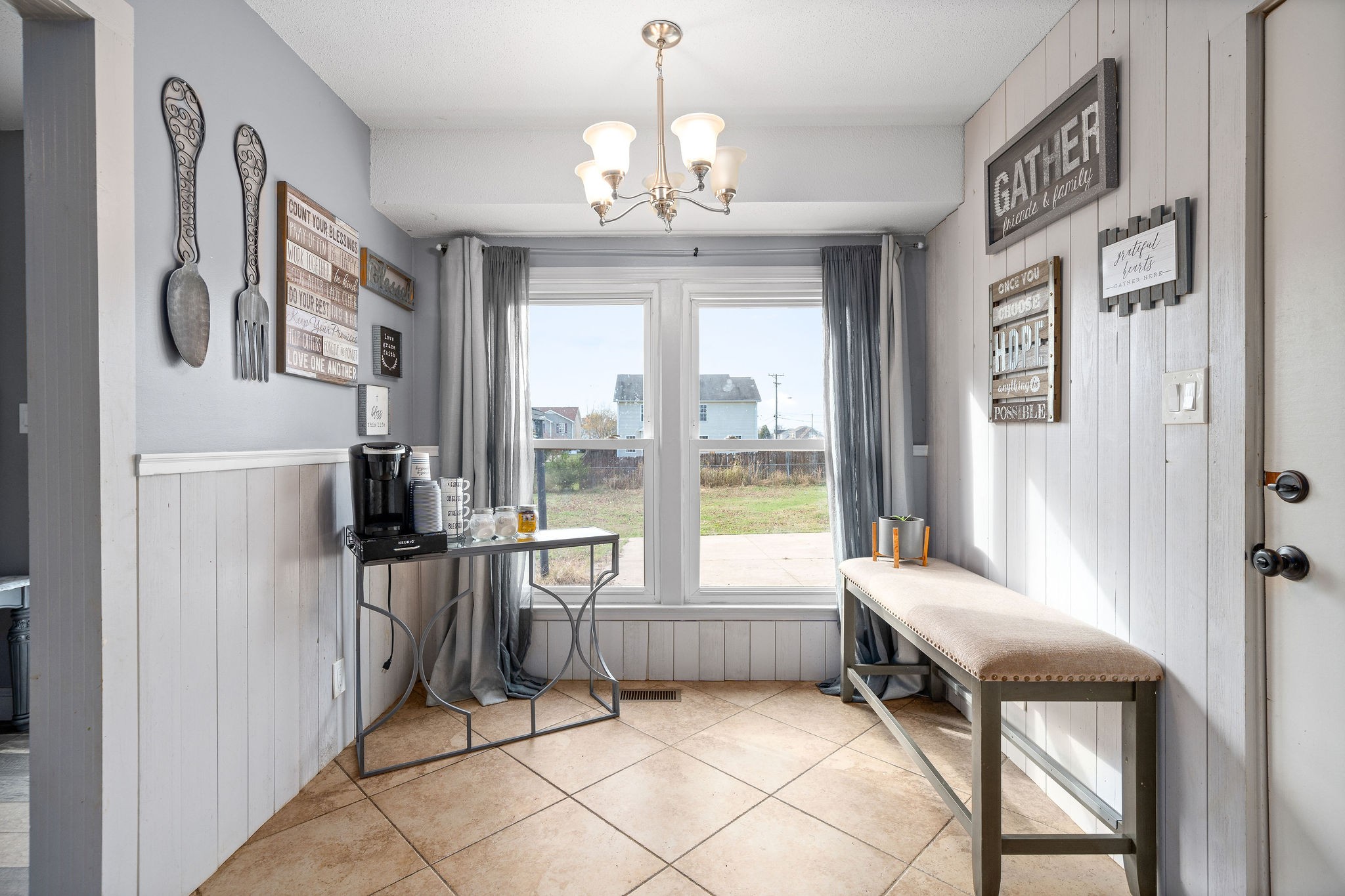 3410 Allen Road Clarksville, TN 37042 - Photo 6 of 12 a very nice looking room with a large window and chandelier