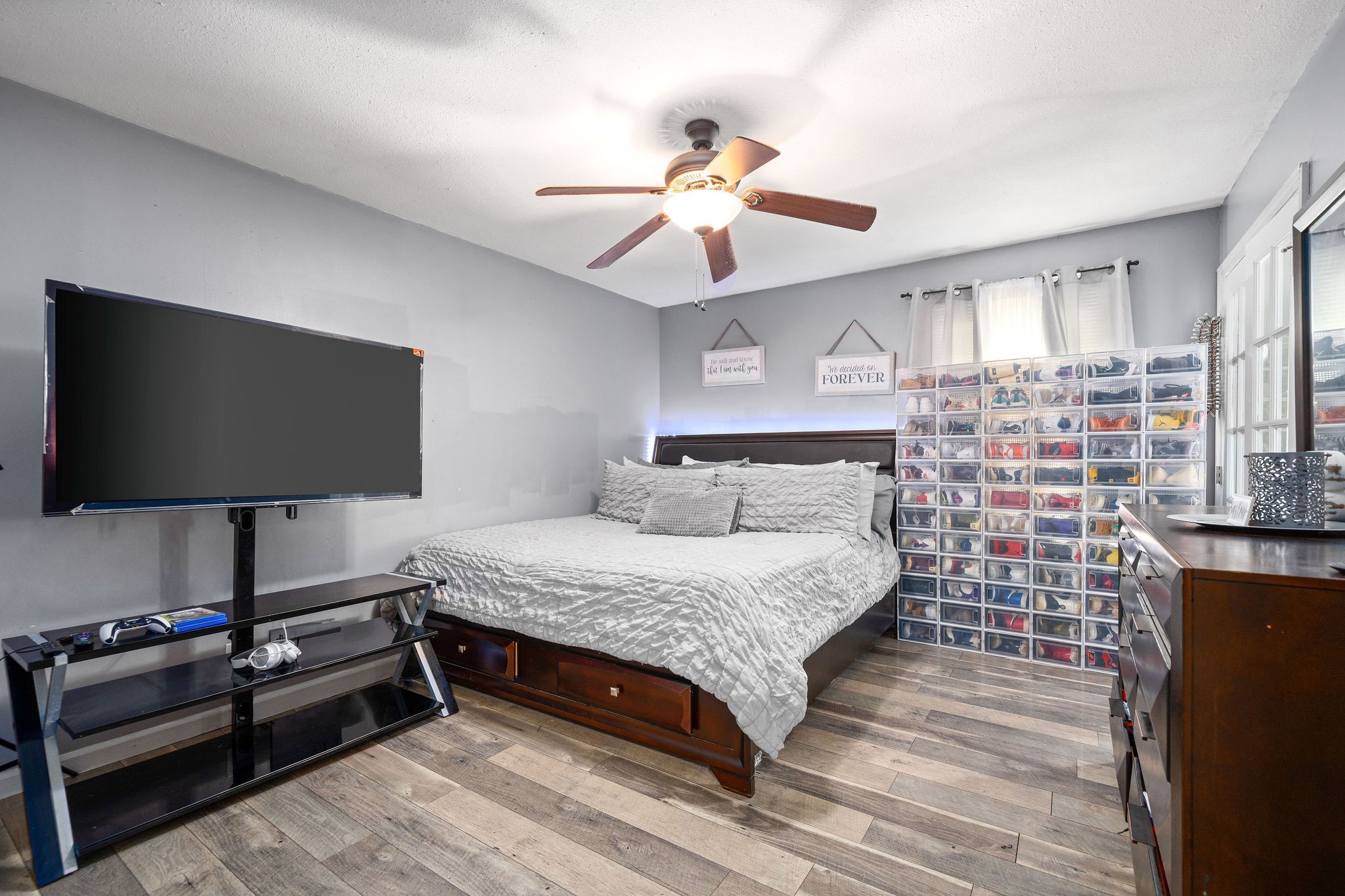 3410 Allen Road Clarksville, TN 37042 - Photo 7 of 12 a bedroom with a bed and a flat screen tv