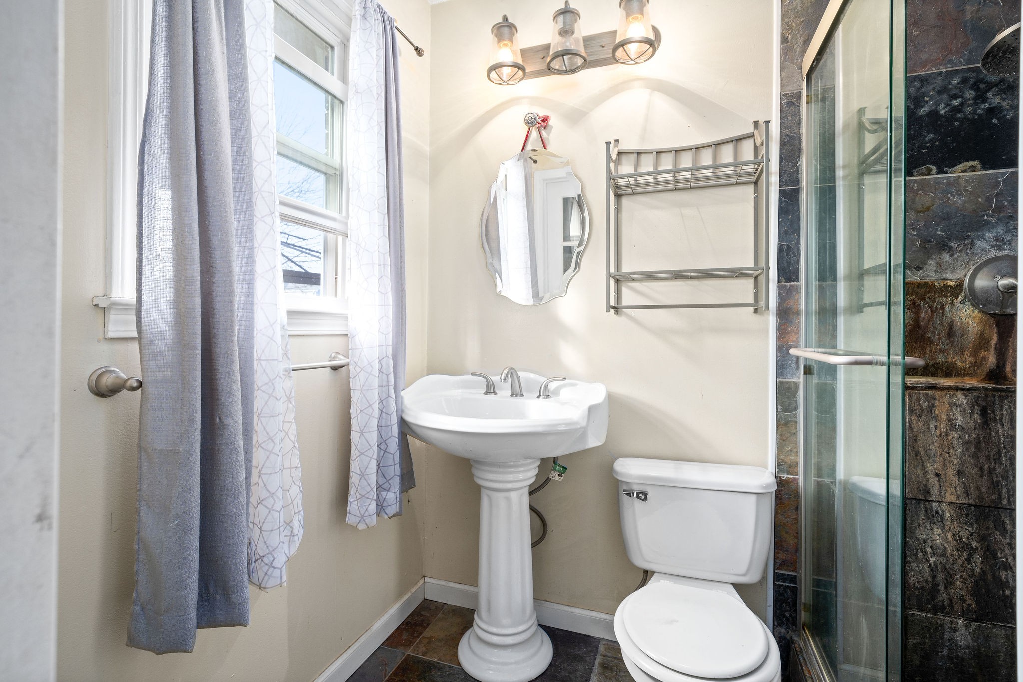 3410 Allen Road Clarksville, TN 37042 - Photo 8 of 12 a bathroom with a toilet sink and shower