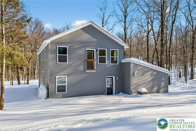 a view of house with a outdoor space