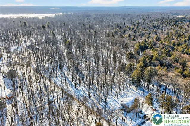 a stone house with a fireplace in it