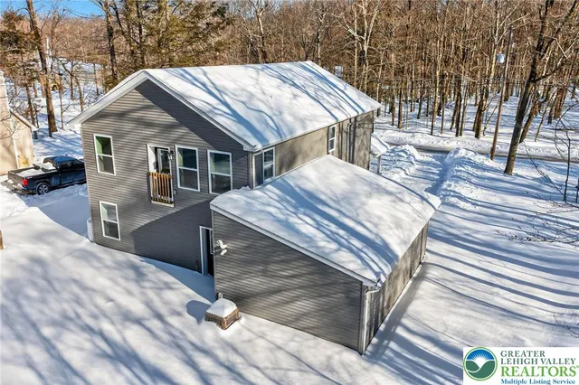 a kitchen with a sink stove and microwave