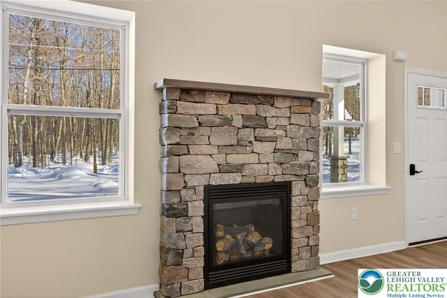 a view of a hallway with windows