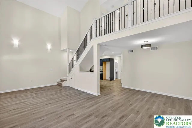 a view of entryway with stairs