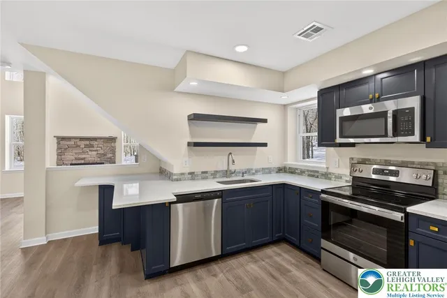 a bathroom with a shower and a bath tub
