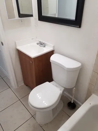a close up of a bathtub in a bathroom