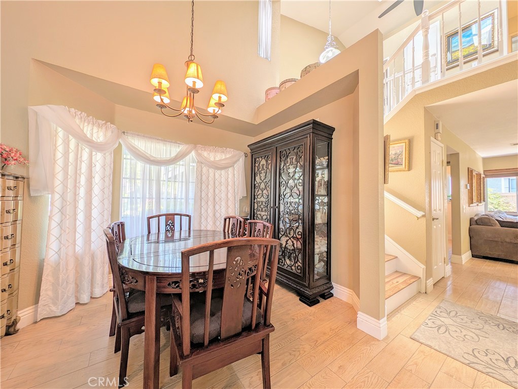 1738 Cambridge Circle Redlands, CA 92374 - Photo 12 of 59 a view of a dining room with furniture window and outside view