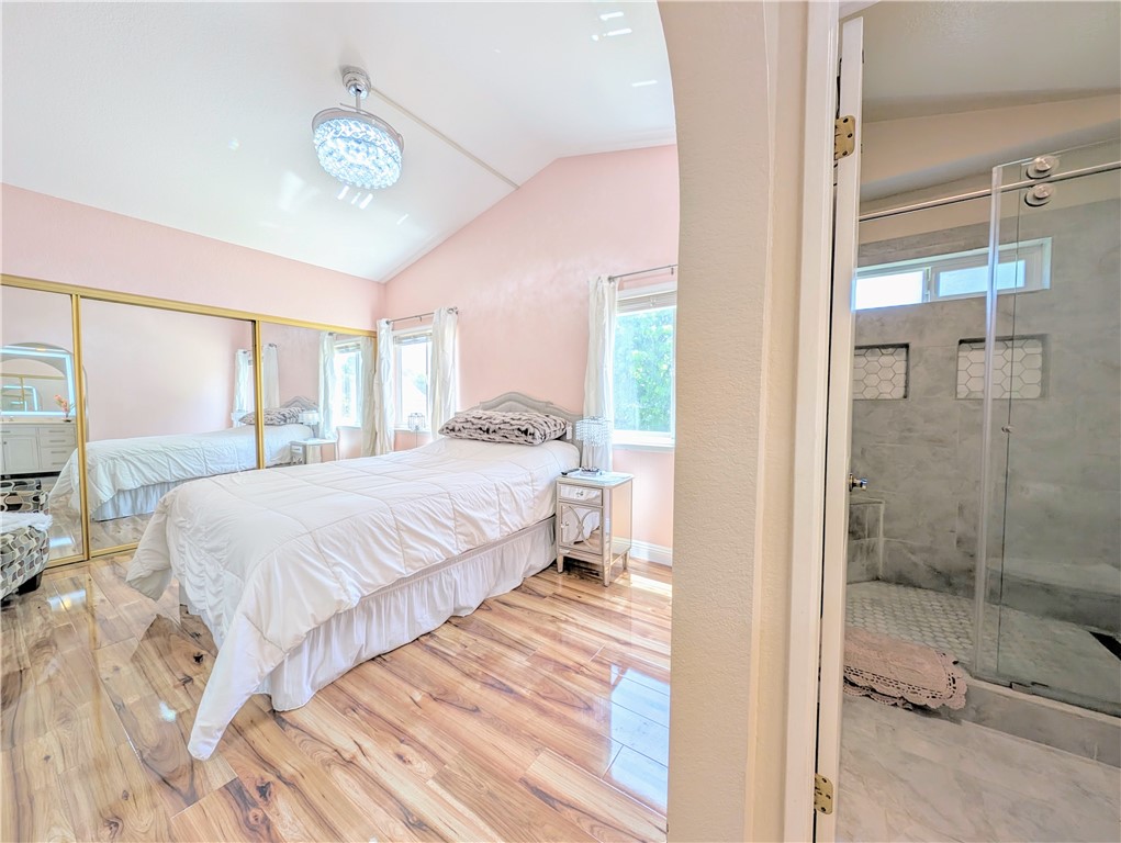 1738 Cambridge Circle Redlands, CA 92374 - Photo 32 of 59 a bedroom with a bed and a window