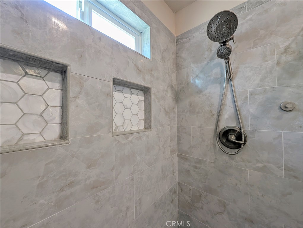 1738 Cambridge Circle Redlands, CA 92374 - Photo 36 of 59 a bathroom with a shower