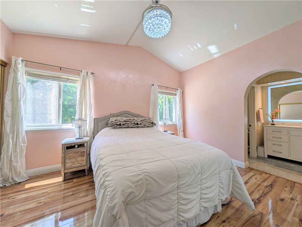 1738 Cambridge Circle Redlands, CA 92374 - Photo 38 of 59 a bedroom with a bed and a window