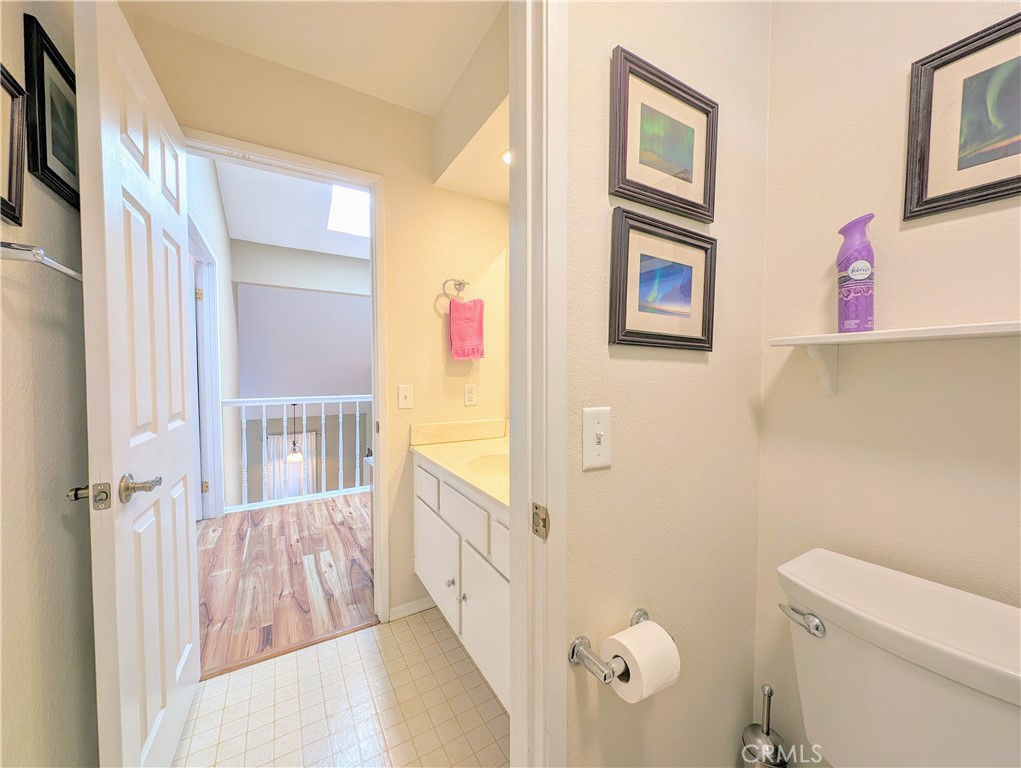 1738 Cambridge Circle Redlands, CA 92374 - Photo 40 of 59 a bathroom with a sink a toilet and shower
