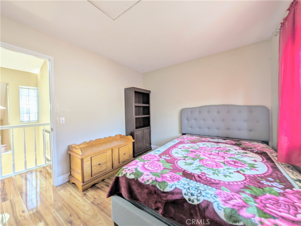 1738 Cambridge Circle Redlands, CA 92374 - Photo 46 of 59 a bedroom with 2 bed and a window